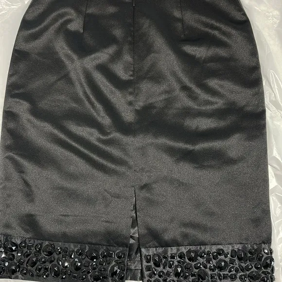 White House Black Market Elegant Black Skirt with Embellished Hem