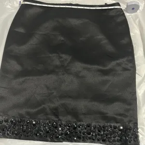 White House Black Market Elegant Black Skirt with Embellished Hem