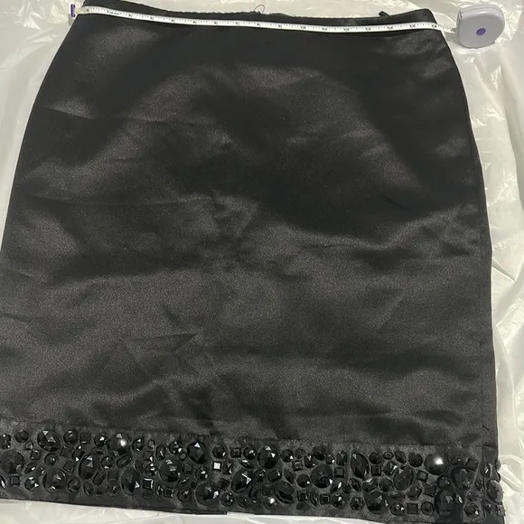 White House Black Market Elegant Black Skirt with Embellished Hem